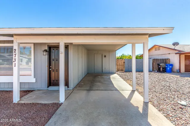 a view of a living room and entry way
