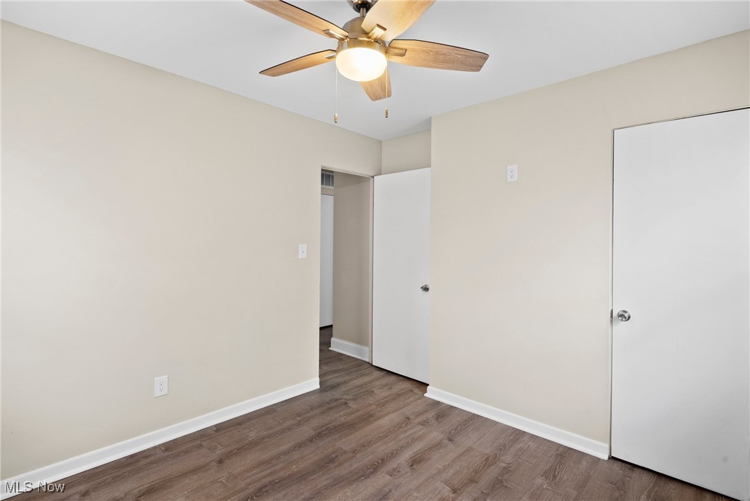 4963 Wake Robin Road Mentor, OH 44060 - Photo 14 of 21 Unfurnished bedroom featuring hardwood / wood-style flooring and ceiling fan