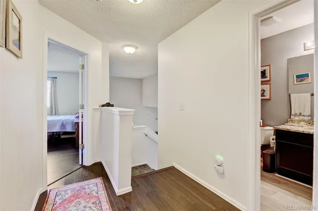 a bedroom with a bed and a view of bathroom