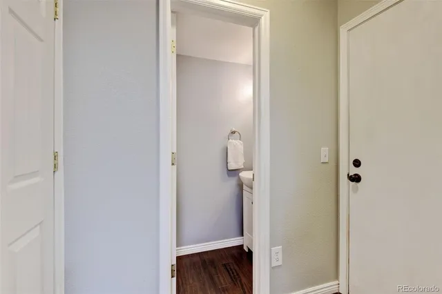 a bedroom with a bed and a ceiling fan