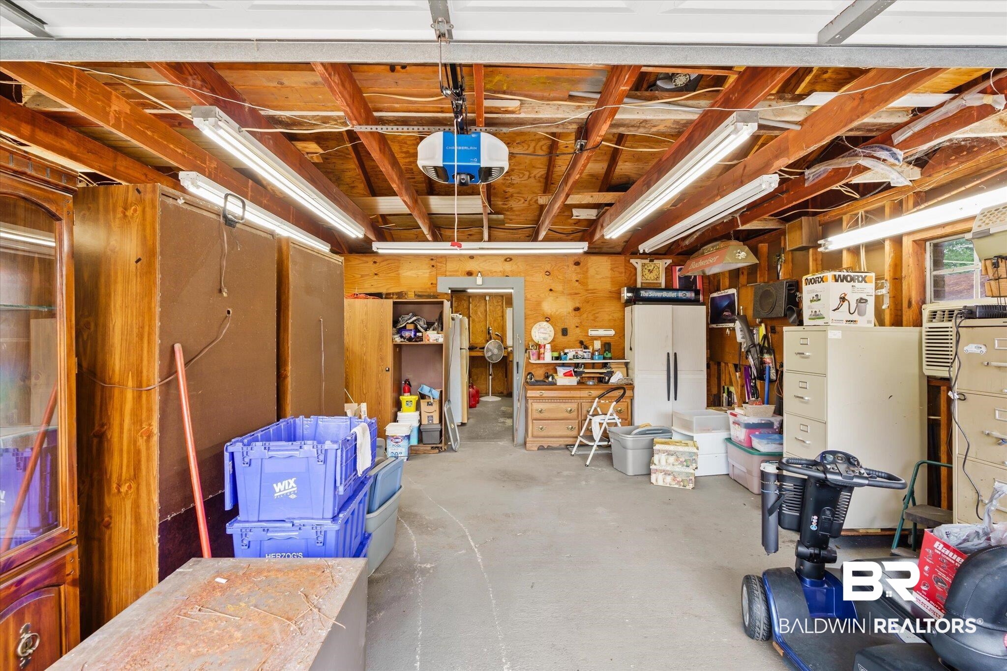 1604 Celeste Road Saraland, AL 36571 - Photo 26 of 31 Garage featuring a garage door opener