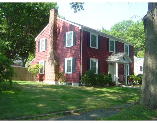 12 Drumlin Road Marblehead, MA 01945 - Photo 1 of 8 a front view of house with yard and green space