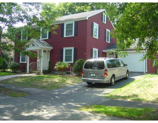 12 Drumlin Road Marblehead, MA 01945 - Photo 2 of 8 a car parked in front of a brick house