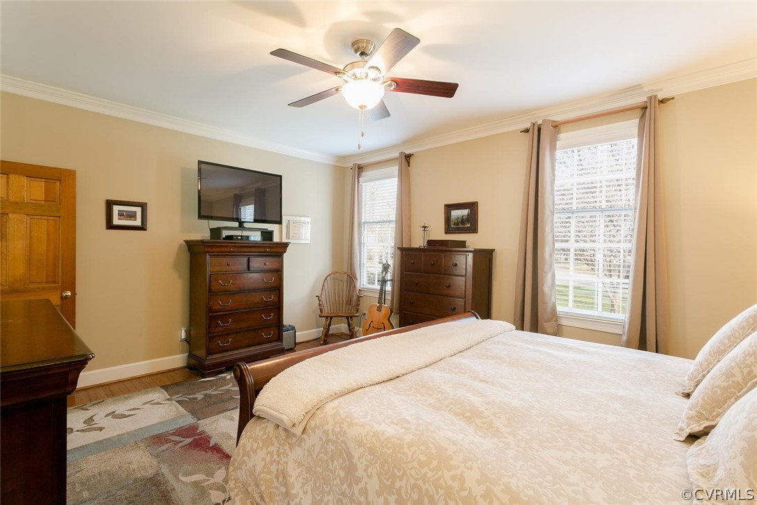 403 Rivers Bend Court Chester, VA 23836 - Photo 20 of 39 a bedroom with a bed and a flat screen tv