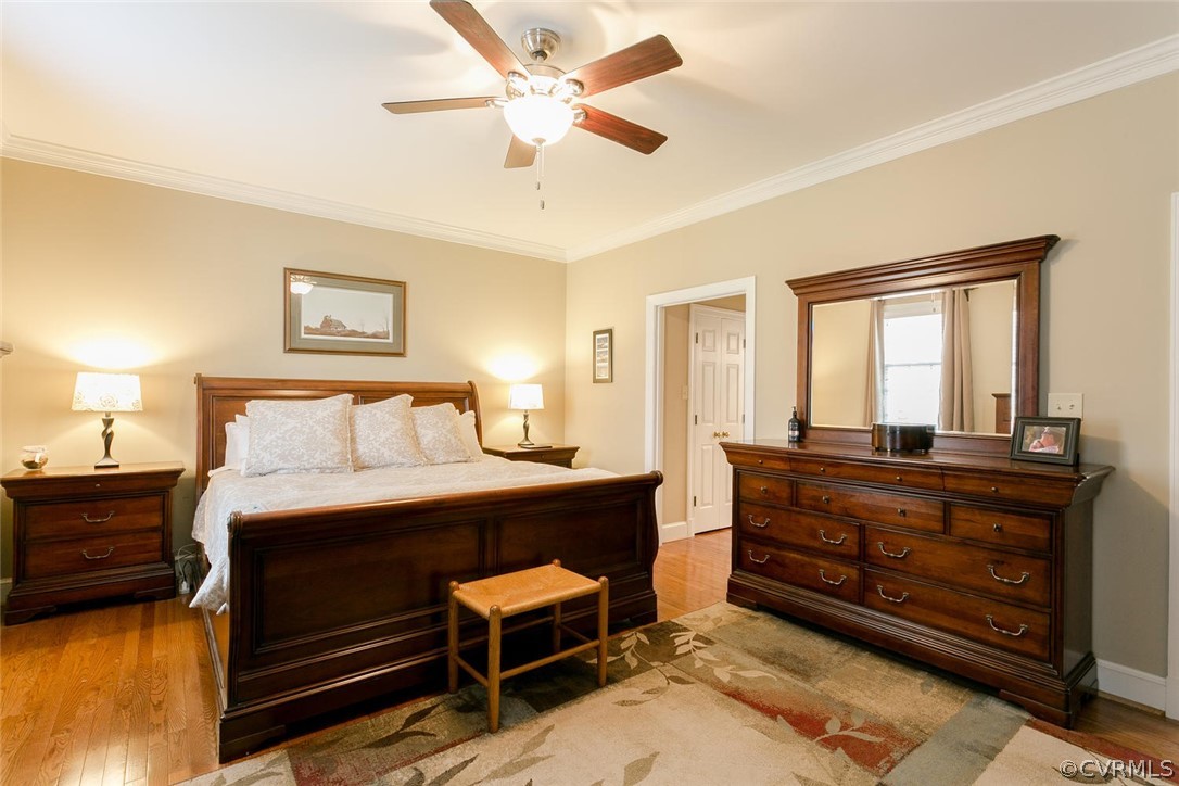 403 Rivers Bend Court Chester, VA 23836 - Photo 21 of 39 a bed room with a bed and a chandelier