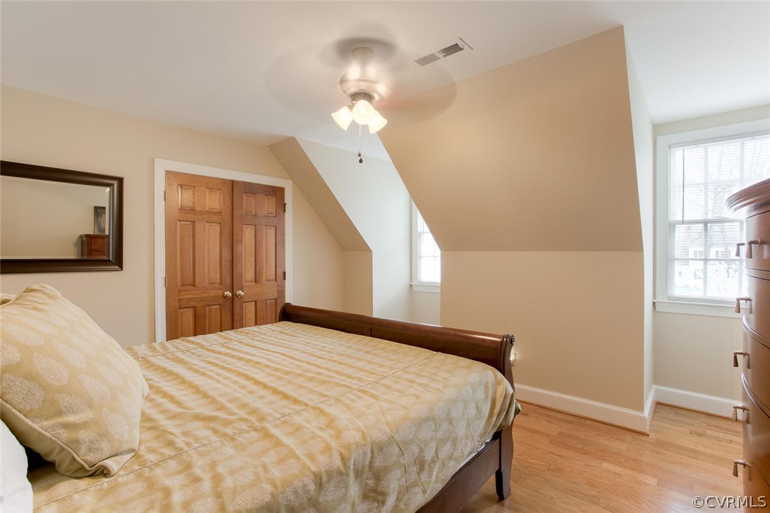 403 Rivers Bend Court Chester, VA 23836 - Photo 34 of 39 a bedroom with a bed and a mirror