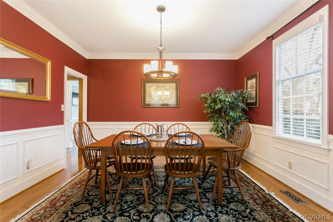 403 Rivers Bend Court Chester, VA 23836 - Photo 6 of 39 a view of a dining room with furniture and window