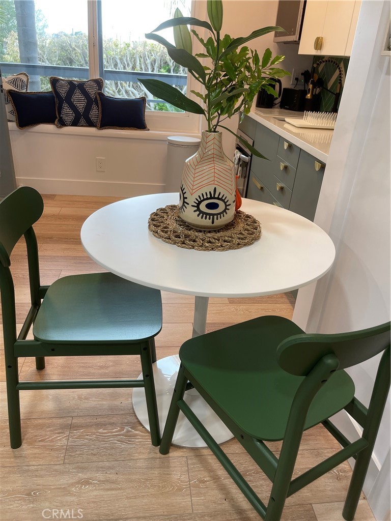 736 Griffith Place Laguna Beach, CA 92651 - Photo 14 of 31 a living room with furniture and a potted plant