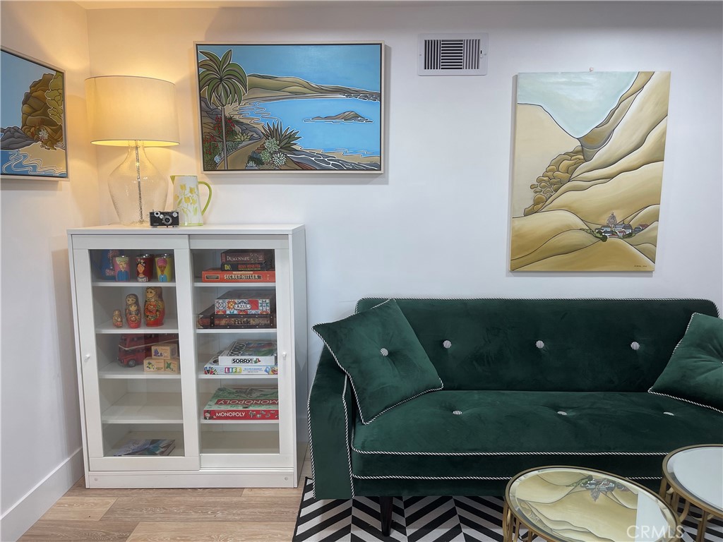 736 Griffith Place Laguna Beach, CA 92651 - Photo 15 of 31 a living room with furniture and wooden floor