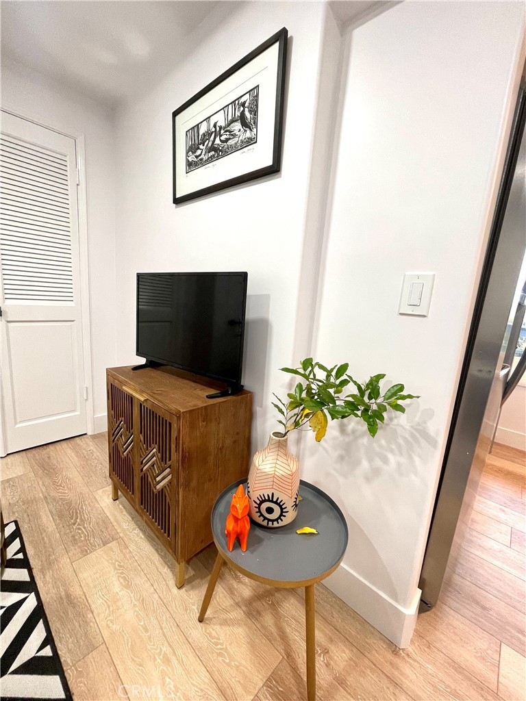 736 Griffith Place Laguna Beach, CA 92651 - Photo 16 of 31 a living room with furniture and a potted plant