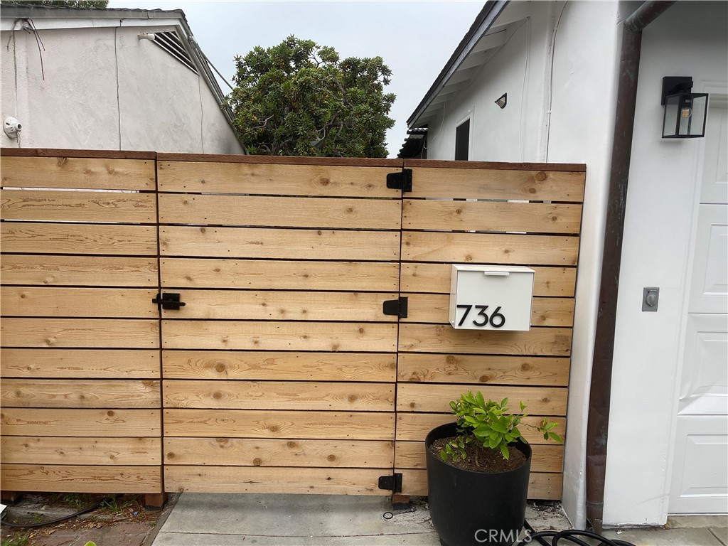 736 Griffith Place Laguna Beach, CA 92651 - Photo 2 of 31 a view of a house with a potted plant