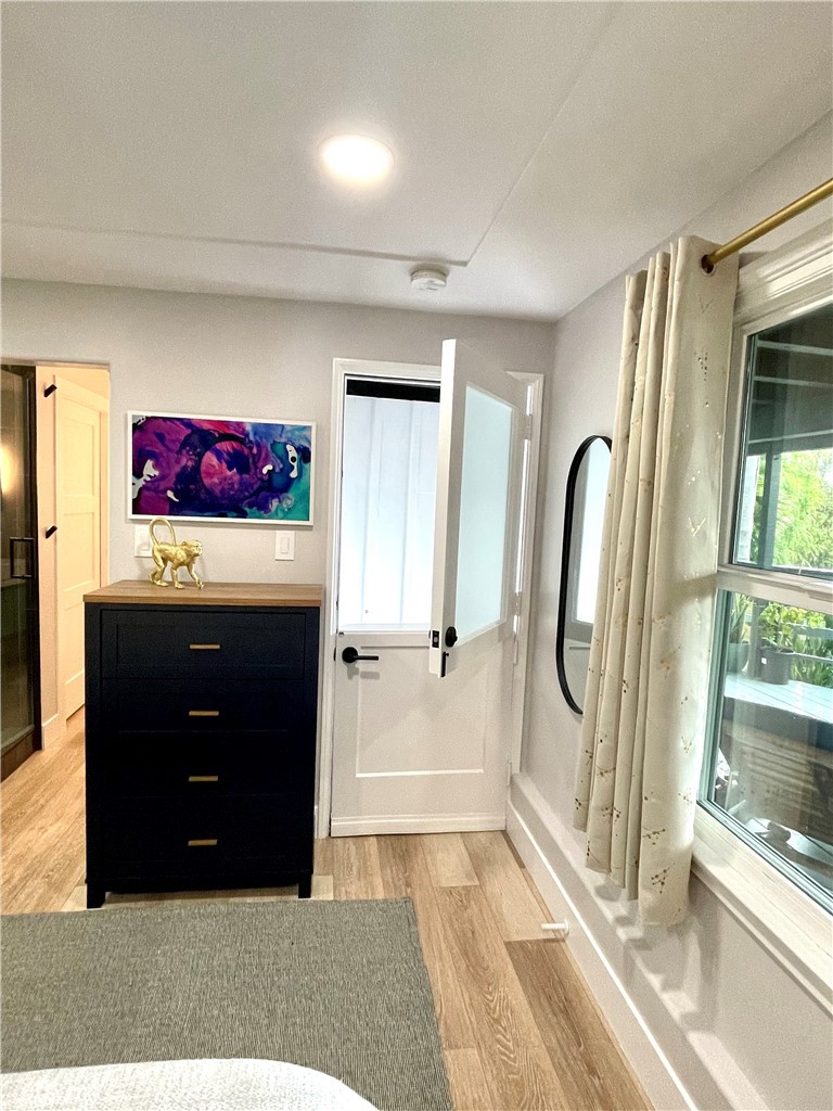 736 Griffith Place Laguna Beach, CA 92651 - Photo 21 of 31 a living room with a furniture and a dresser