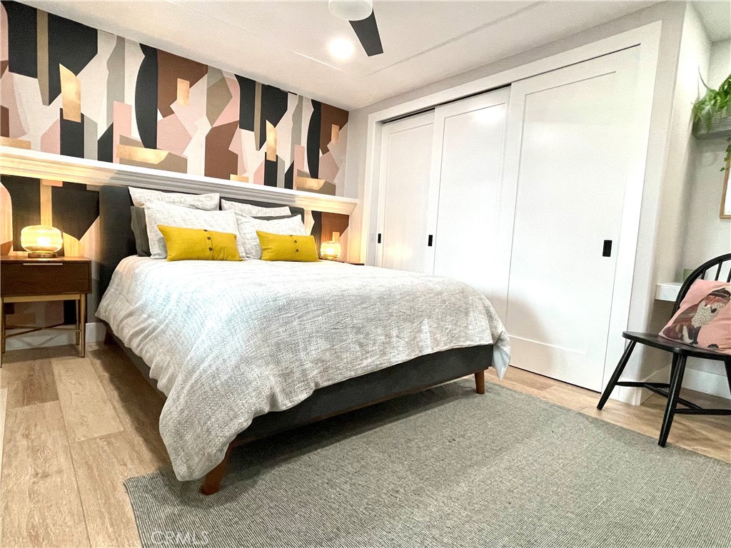 736 Griffith Place Laguna Beach, CA 92651 - Photo 23 of 31 a bedroom with a bed and a window