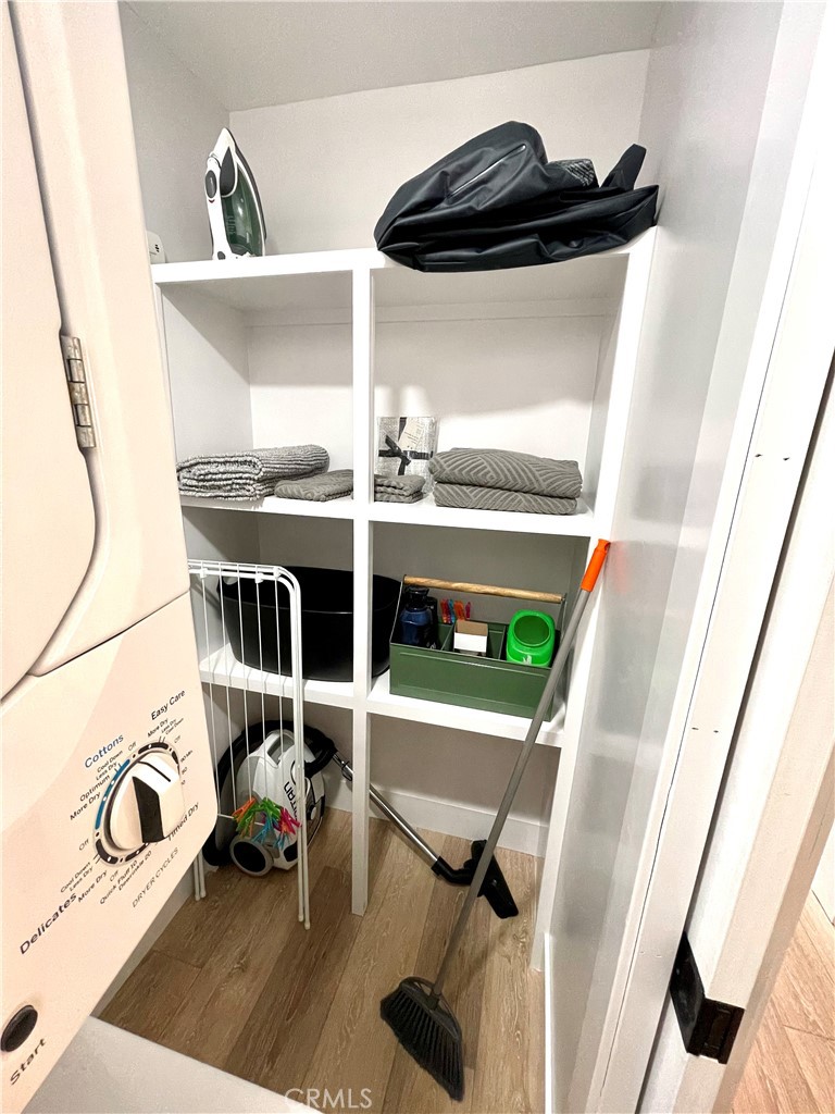 736 Griffith Place Laguna Beach, CA 92651 - Photo 31 of 31 a view of walk in closet with clothes and shoes