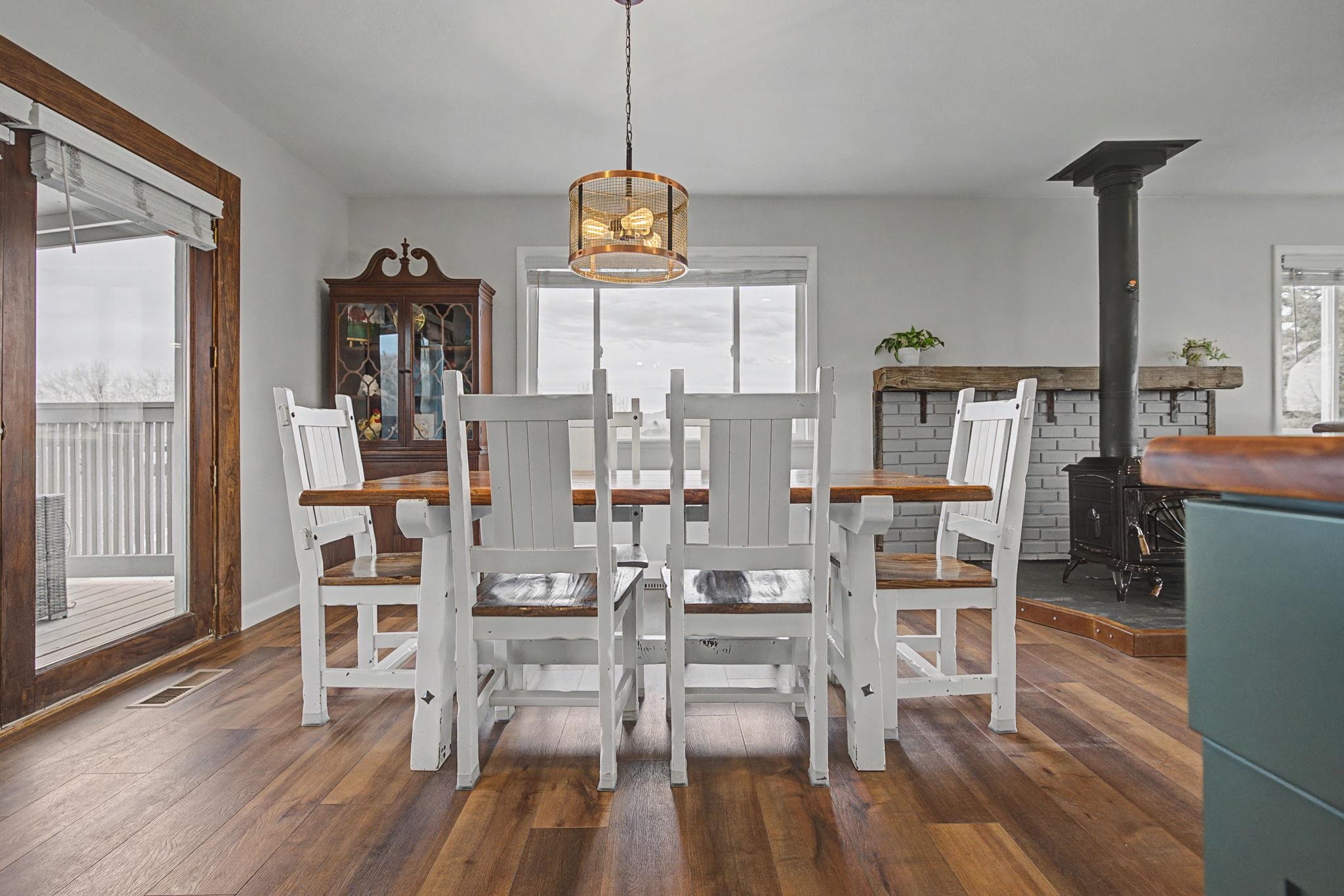 847 26 Road Grand Junction, CO 81505 - Photo 11 of 41 a view of a dining room with furniture window and wooden floor