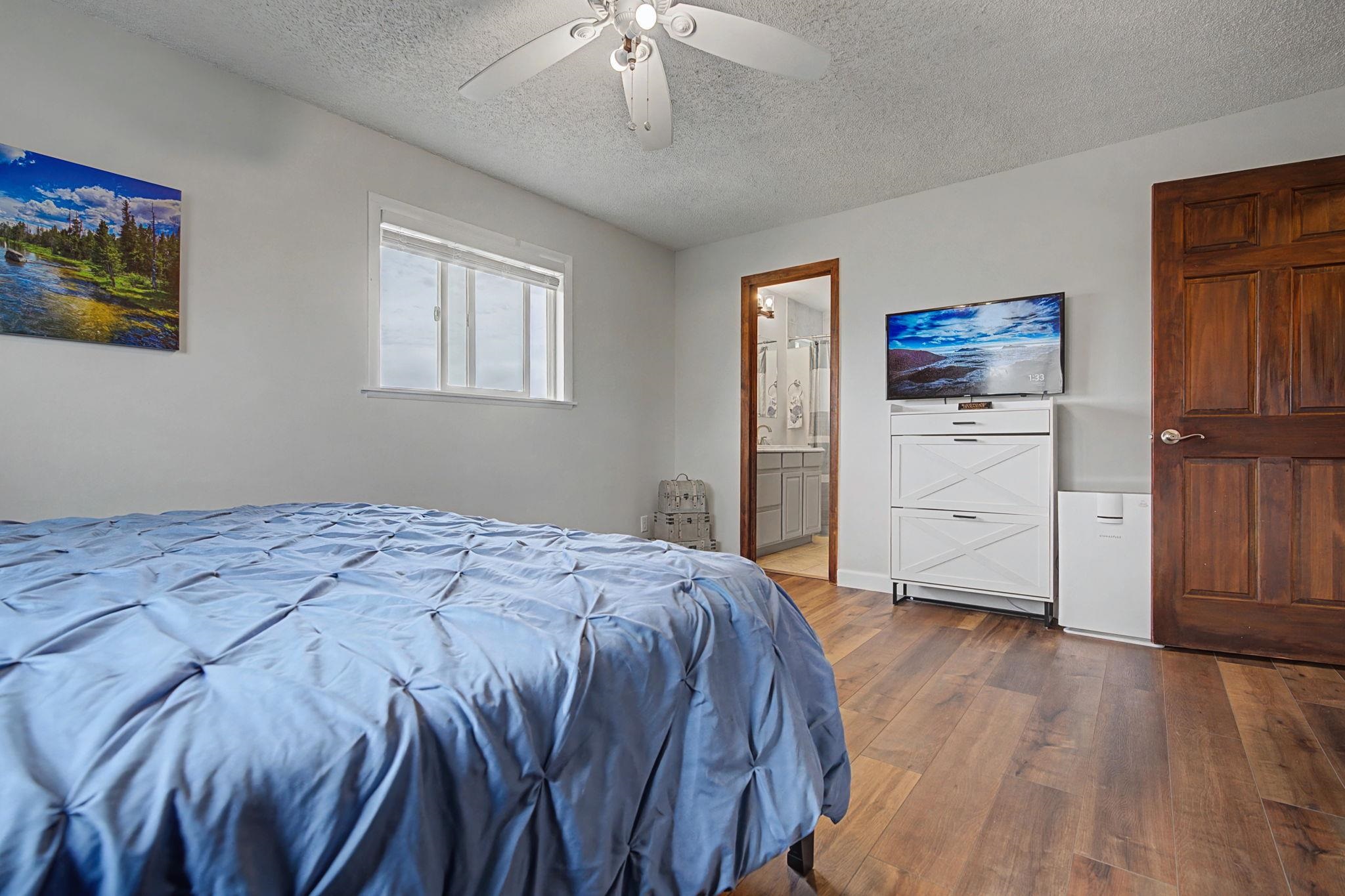 847 26 Road Grand Junction, CO 81505 - Photo 15 of 41 a bedroom with a bed and a view of kitchen