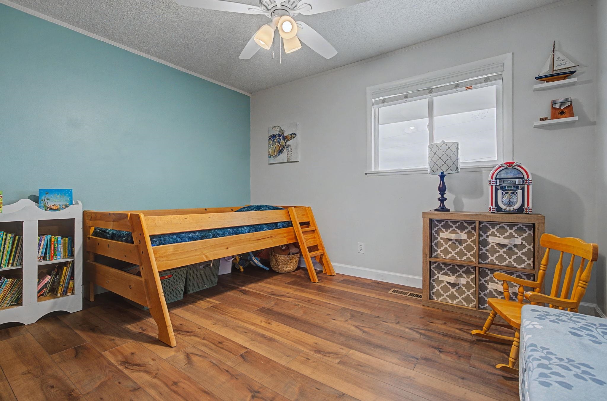 847 26 Road Grand Junction, CO 81505 - Photo 18 of 41 a room with furniture and a wooden floor