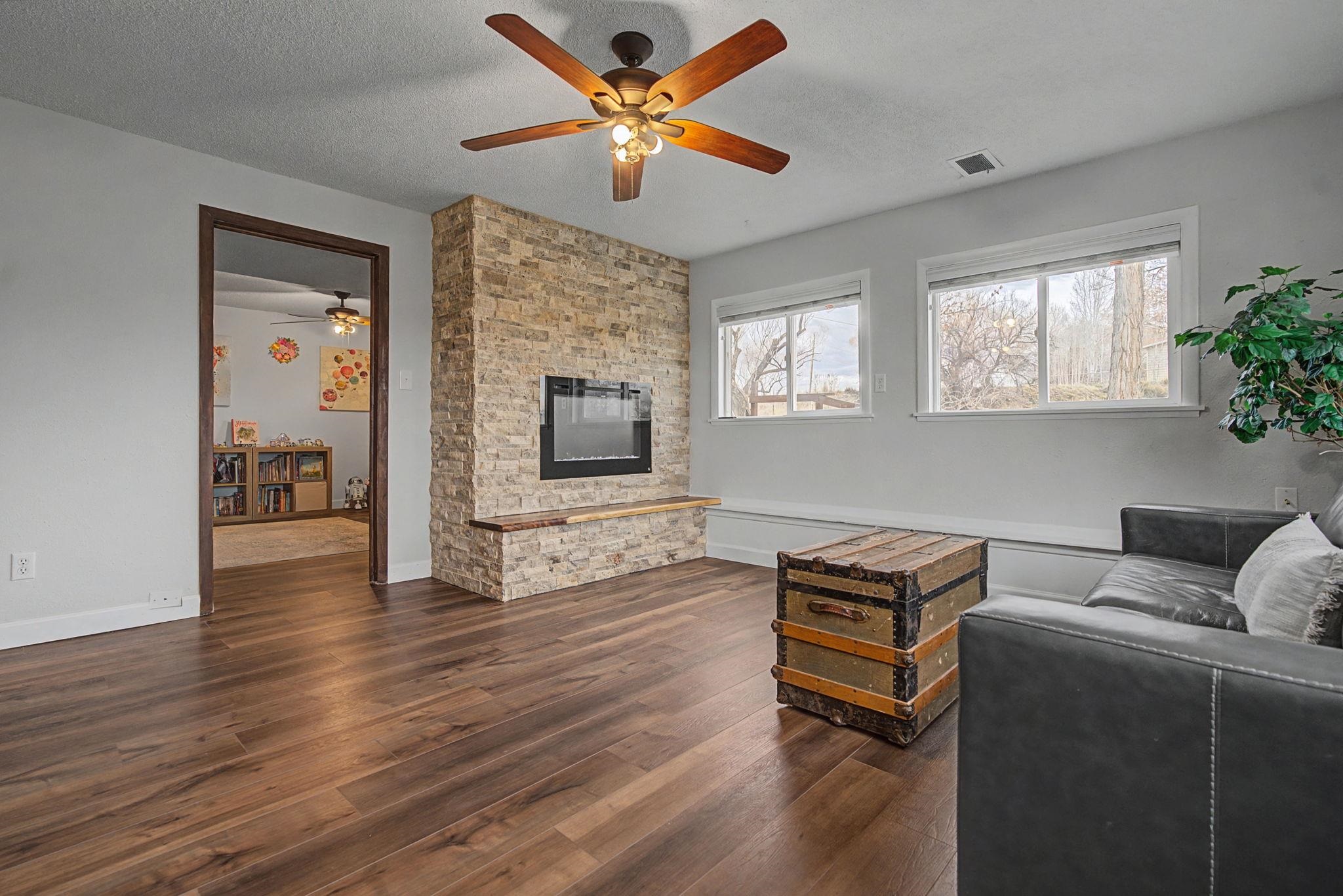 847 26 Road Grand Junction, CO 81505 - Photo 21 of 41 a living room with furniture and a flat screen tv