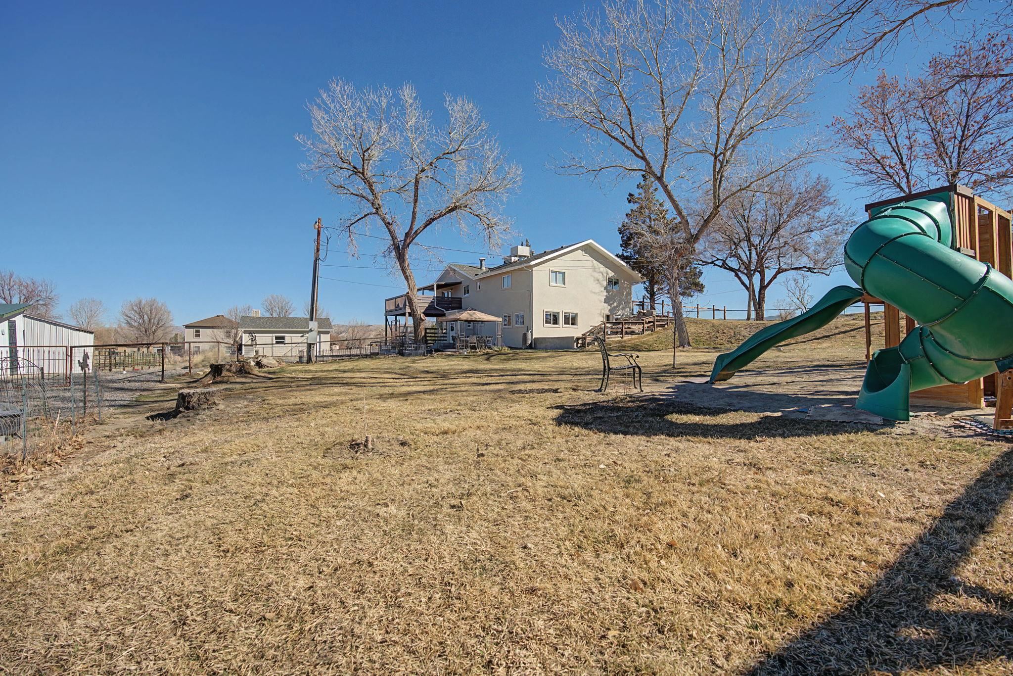 847 26 Road Grand Junction, CO 81505 - Photo 28 of 41 a view of a yard with a house