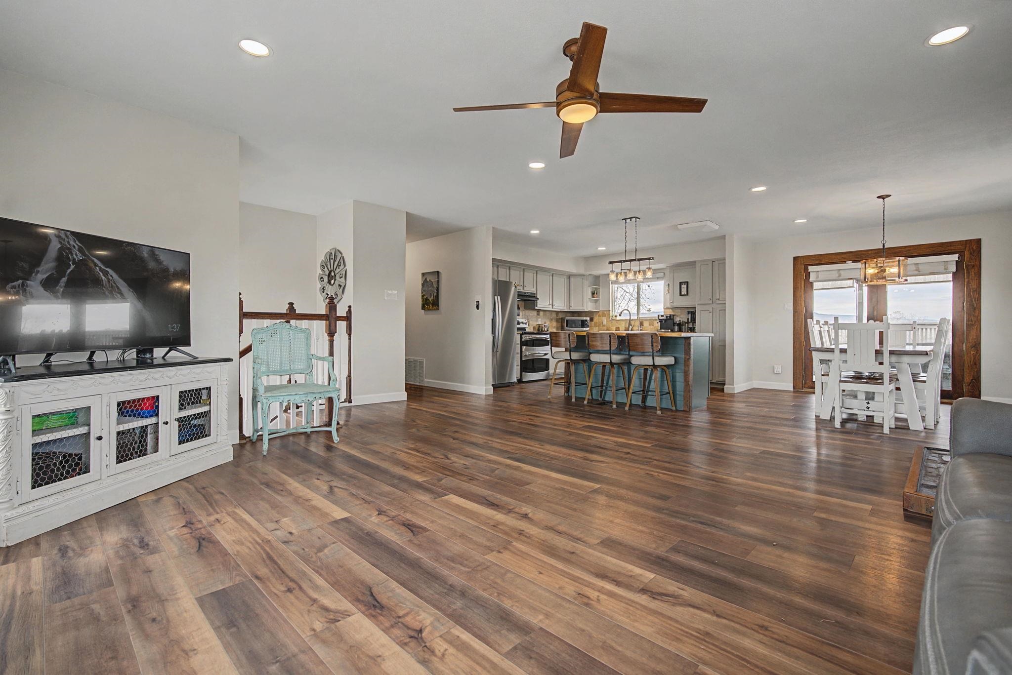 847 26 Road Grand Junction, CO 81505 - Photo 6 of 41 a living room with furniture and a flat screen tv