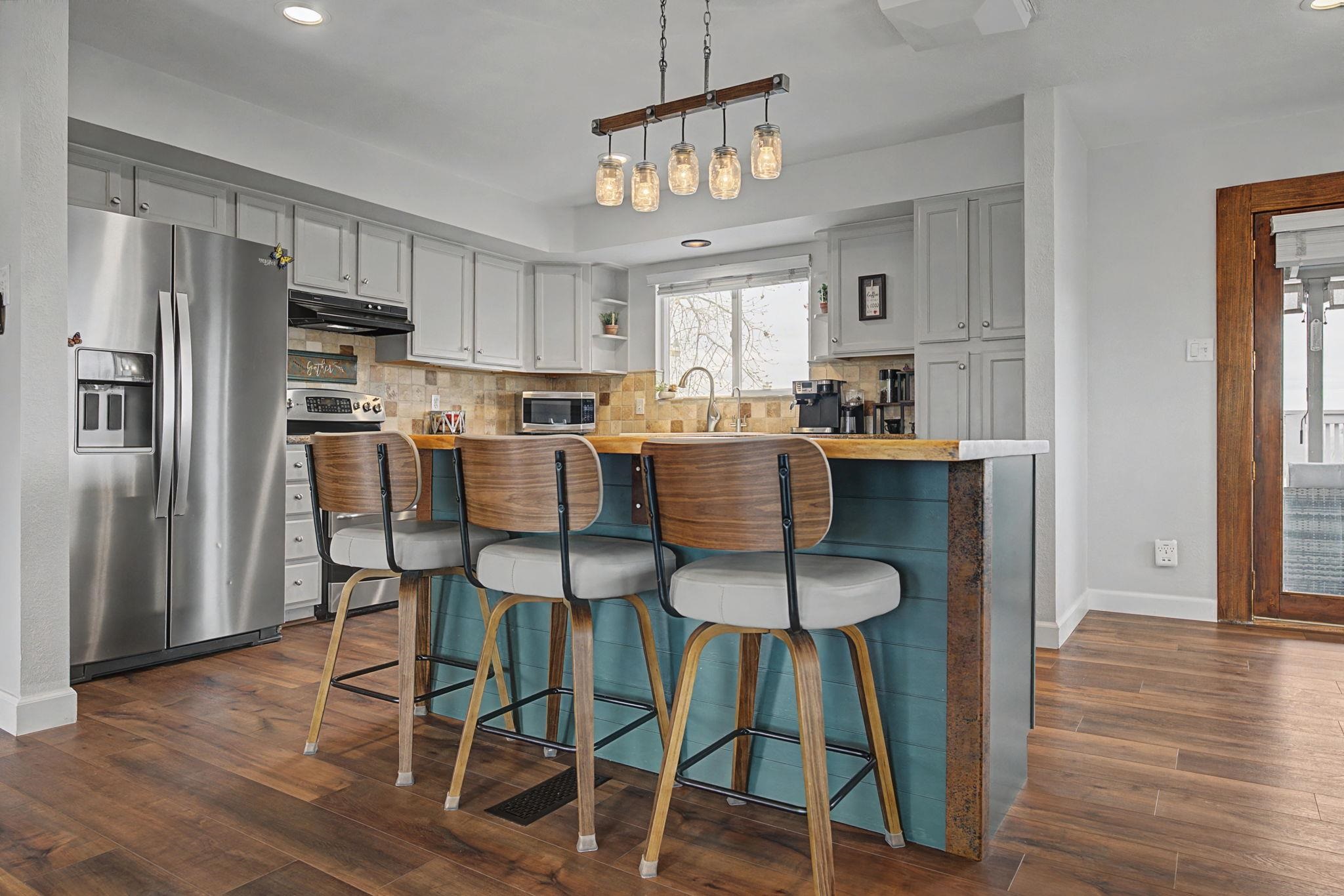 847 26 Road Grand Junction, CO 81505 - Photo 8 of 41 a view of a dining room with furniture window and wooden floor