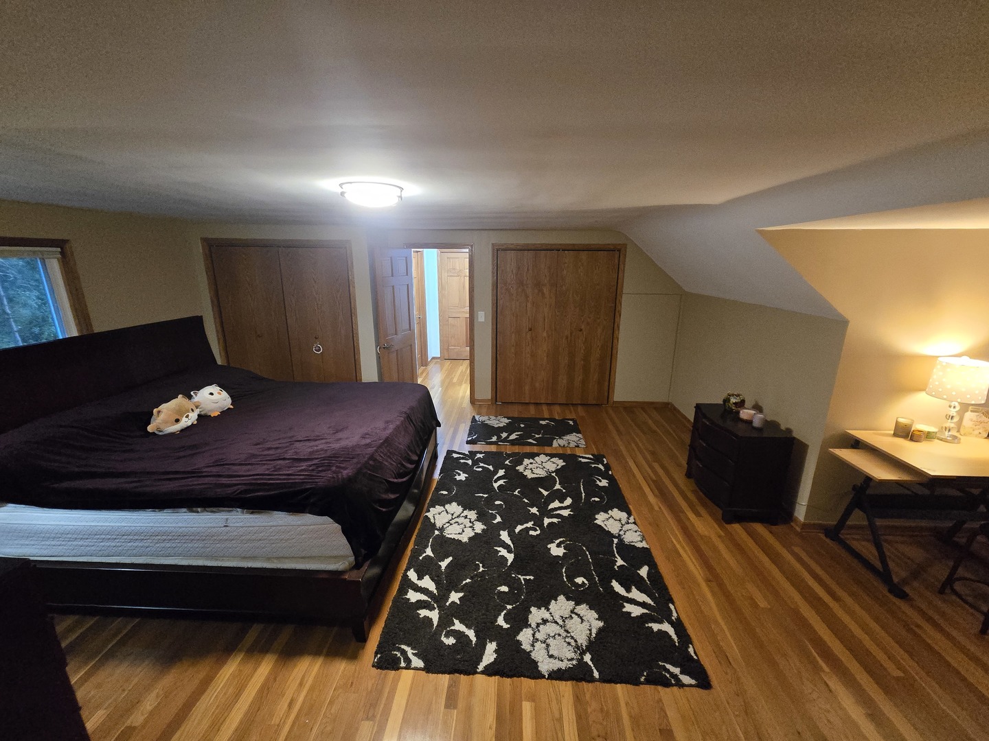 25W201 Summit Drive Naperville, IL 60563 - Photo 20 of 40 a bed sitting in a room next to a window