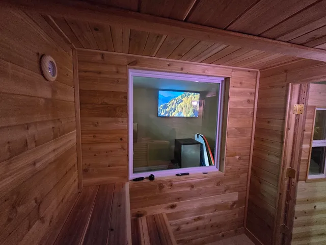 a view of room with wooden floor