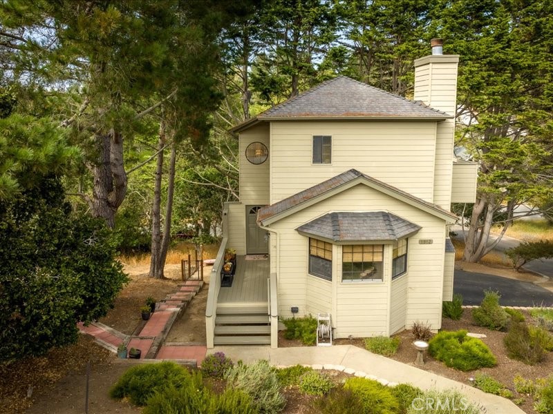 1912 Chester Lane Cambria, CA 93428 - Photo 1 of 41 a front view of a house with a yard