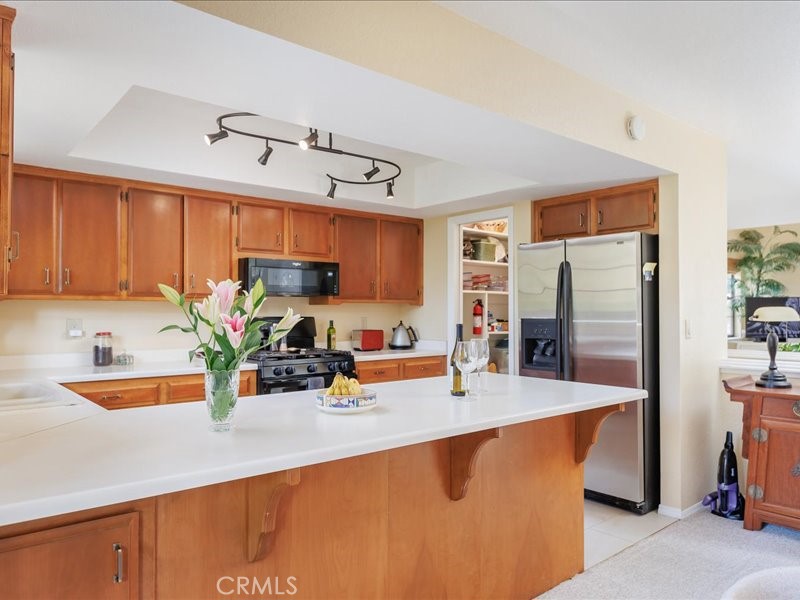 1912 Chester Lane Cambria, CA 93428 - Photo 12 of 41 a kitchen with sink a counter top space and appliances
