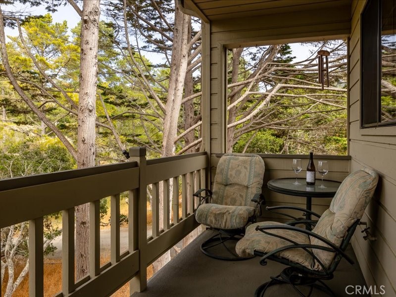 1912 Chester Lane Cambria, CA 93428 - Photo 15 of 41 a view of a chairs and table in the balcony