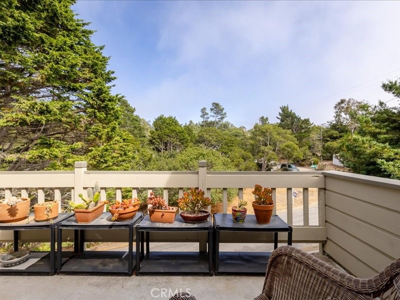 1912 Chester Lane Cambria, CA 93428 - Photo 21 of 41 a view of a balcony with outdoor seating