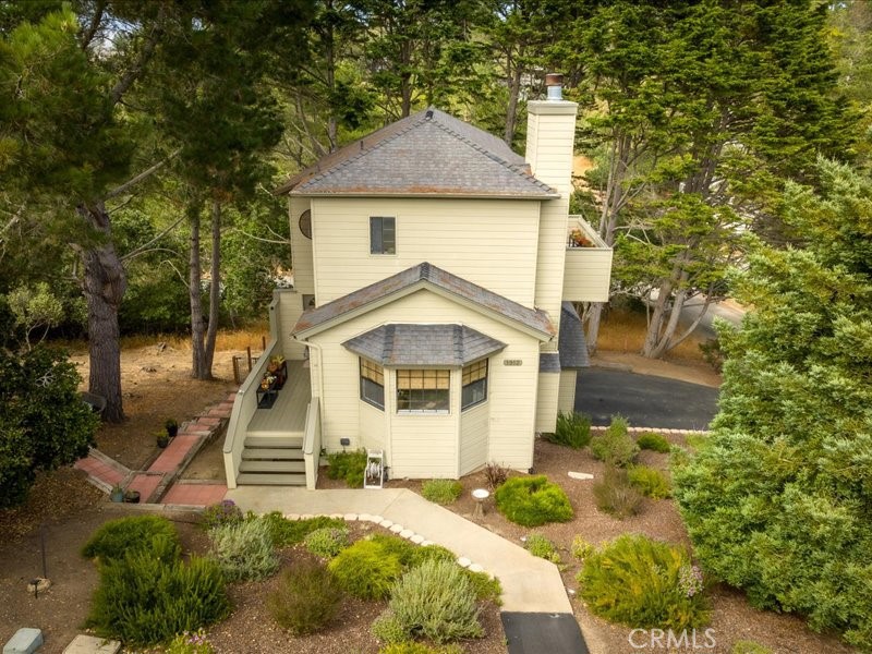 1912 Chester Lane Cambria, CA 93428 - Photo 25 of 41 a front view of a house with garden