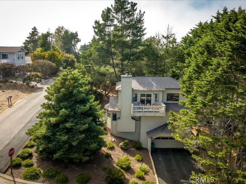 1912 Chester Lane Cambria, CA 93428 - Photo 29 of 41 a view of a house with a yard
