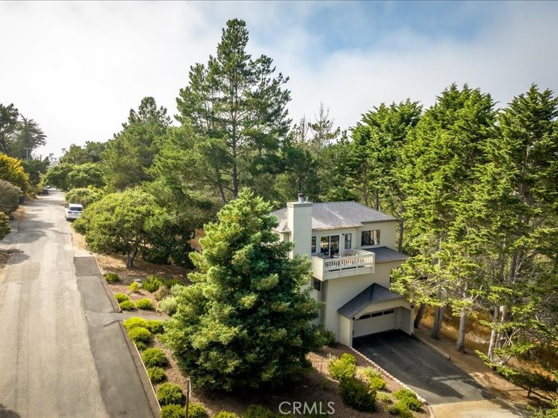 1912 Chester Lane Cambria, CA 93428 - Photo 3 of 41 an aerial view of a house with a yard basket ball court and outdoor seating