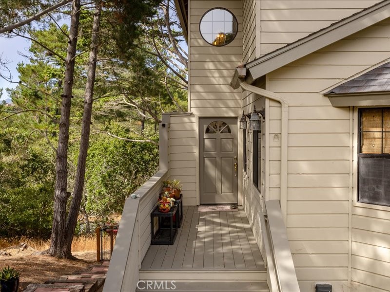 1912 Chester Lane Cambria, CA 93428 - Photo 6 of 41 a front view of a house with a yard