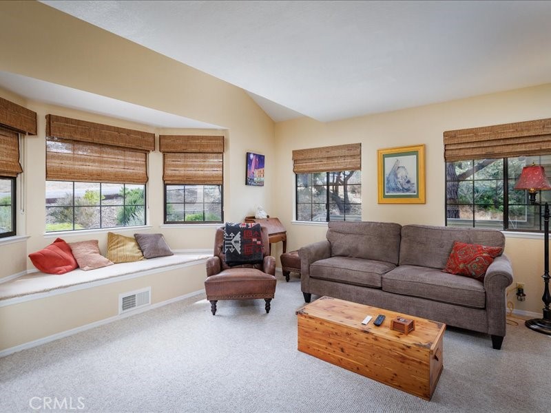 1912 Chester Lane Cambria, CA 93428 - Photo 9 of 41 a living room with furniture and a large window
