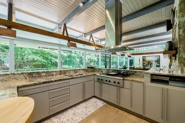 a dining room with furniture and window