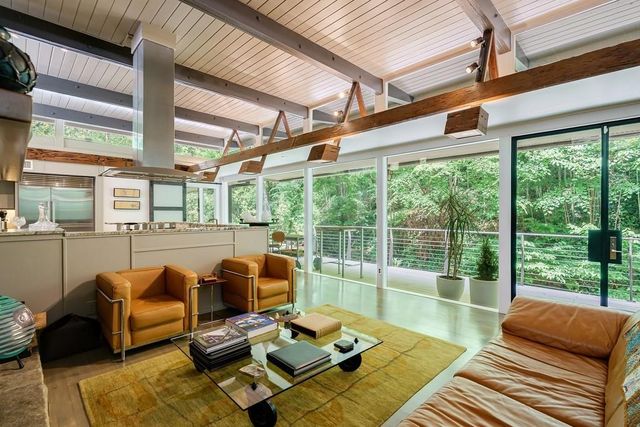 a bed room with a bed and a table