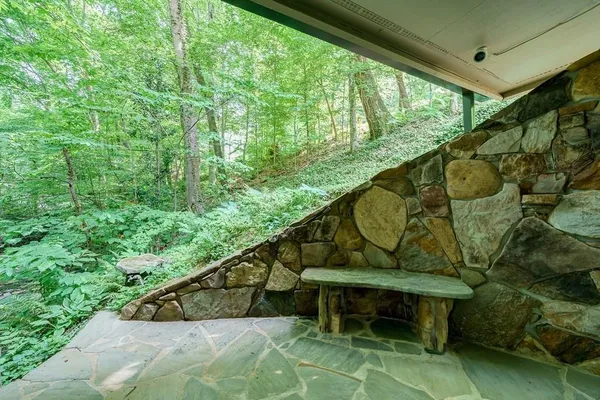 a front view of a house with a patio