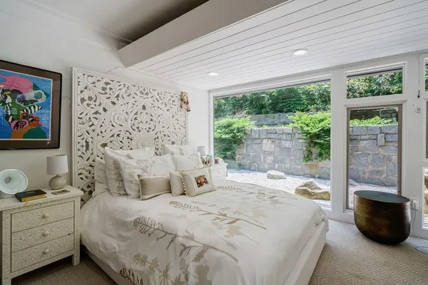 a view of balcony with furniture