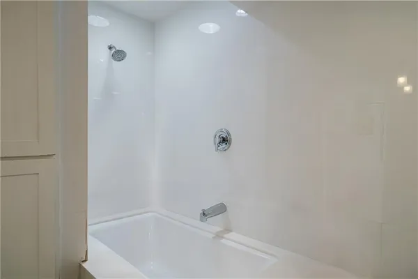 a view of a chairs and table in the patio