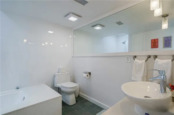 a view of a deck with table and chairs floor to ceiling window with wooden floor