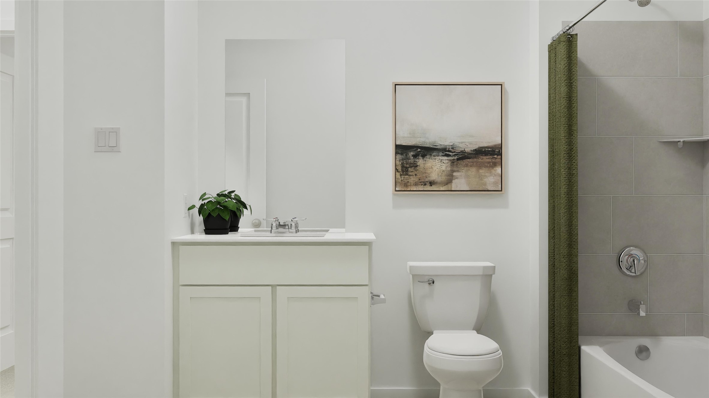 196 Seabreeze Street Kyle, TX 78640 - Photo 17 of 34 a bathroom with a toilet a sink and mirror