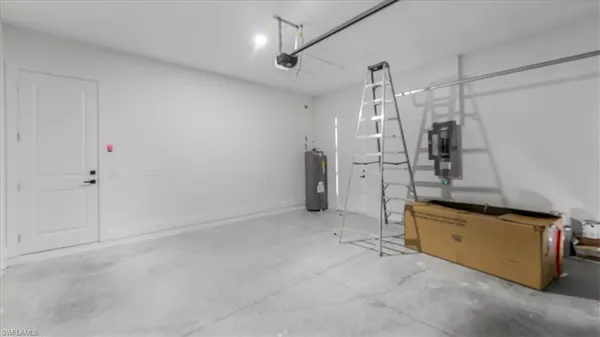 a view of an empty room with a white walls