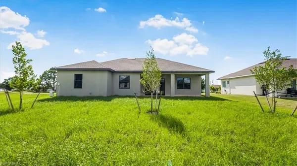 a house view with a garden space