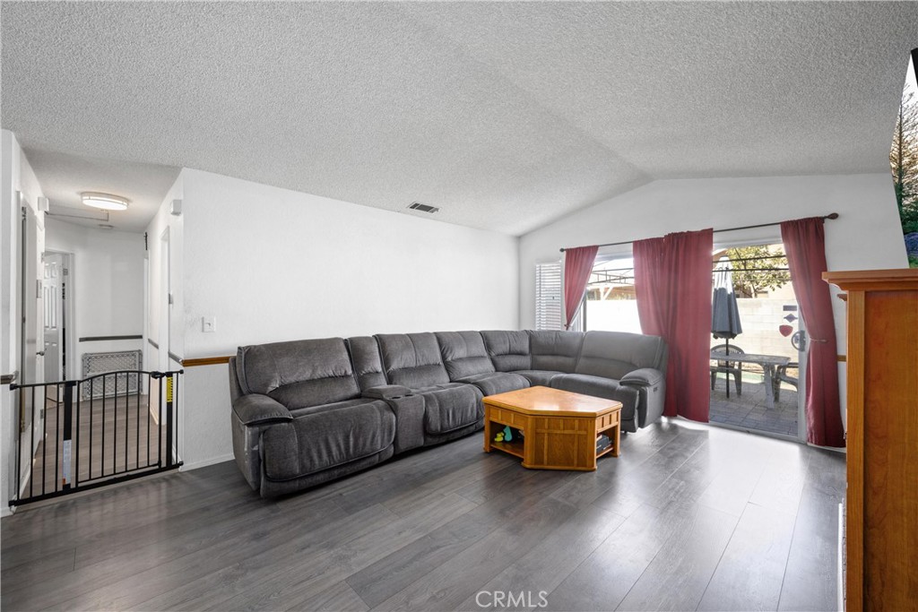 352 Red Spruce Place Perris, CA 92570 - Photo 11 of 30 a living room with furniture and a window