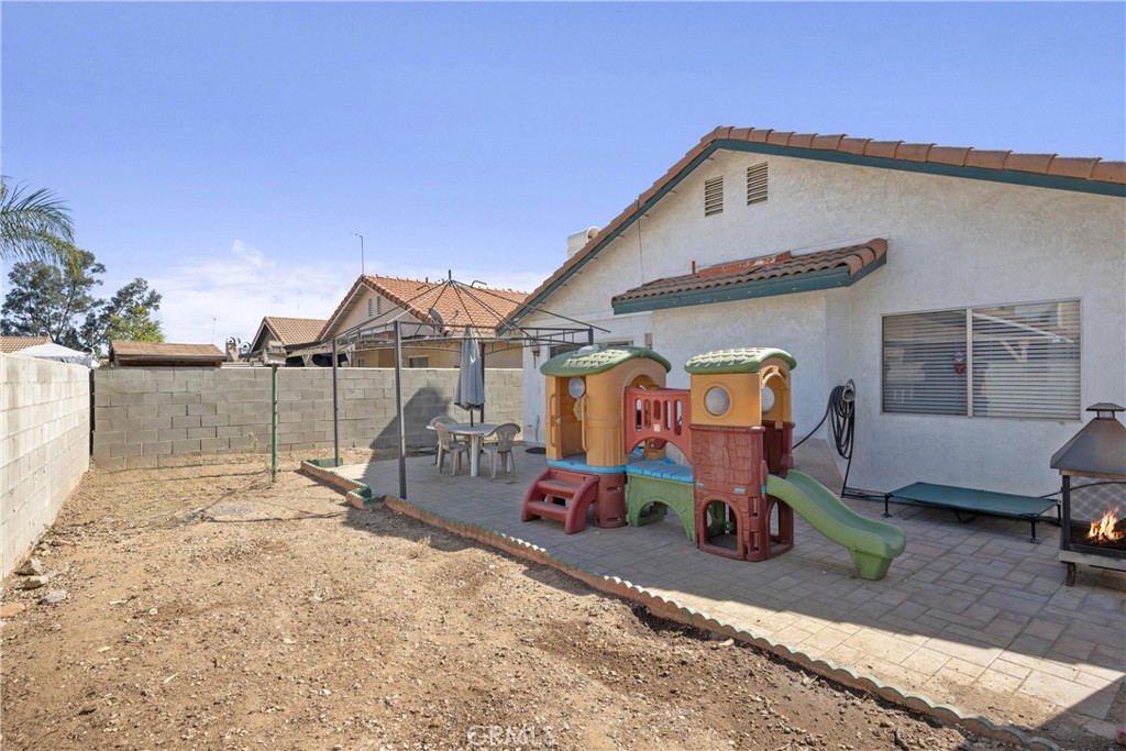 352 Red Spruce Place Perris, CA 92570 - Photo 20 of 30 a front view of a house with garage