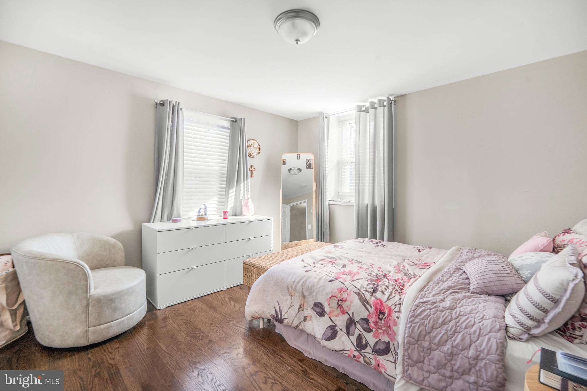 7617 Allendale Circle Landover, MD 20785 - Photo 19 of 26 a bedroom with a bed and a couch