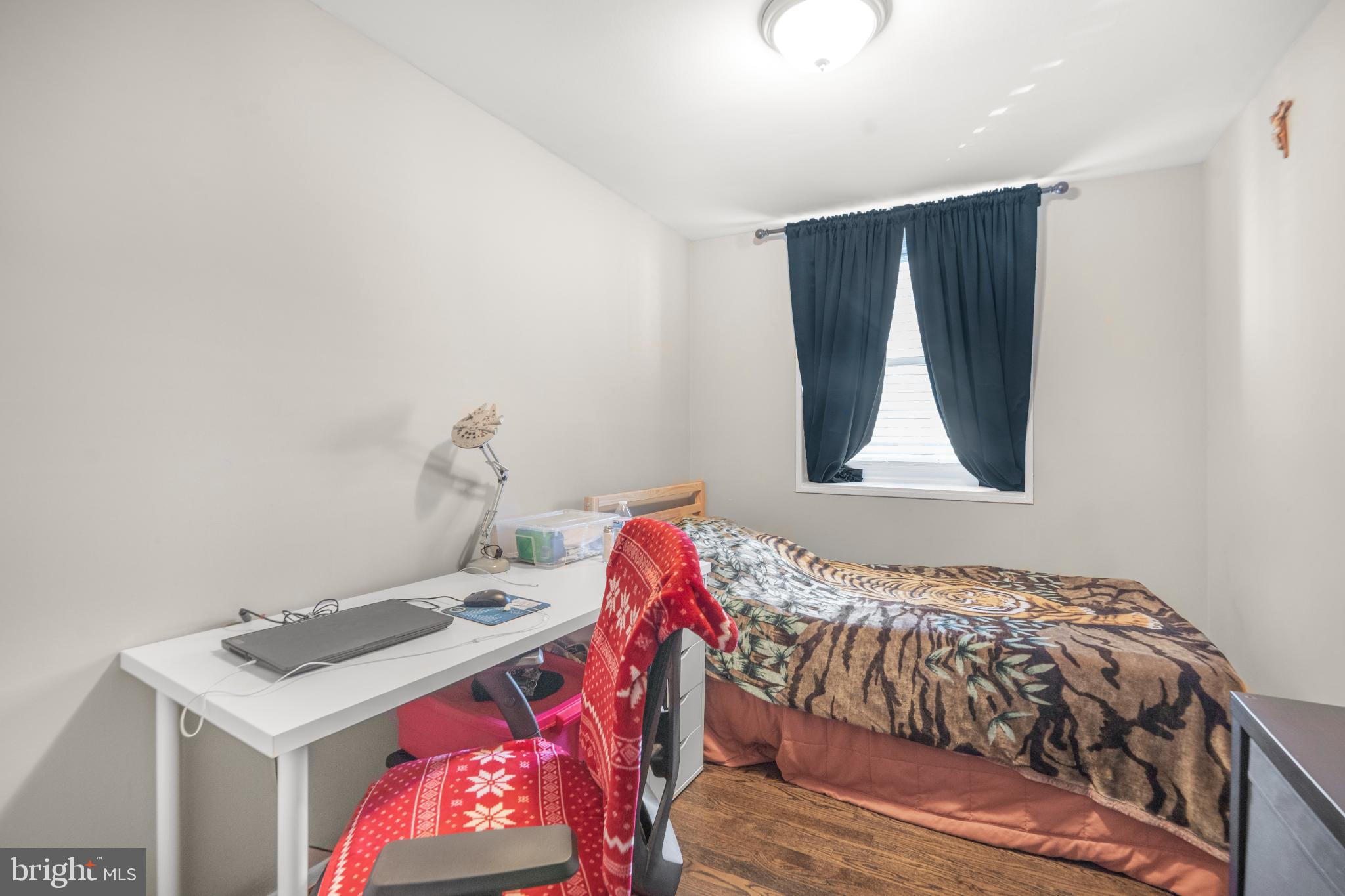 7617 Allendale Circle Landover, MD 20785 - Photo 20 of 26 a bedroom with a bed and a dresser