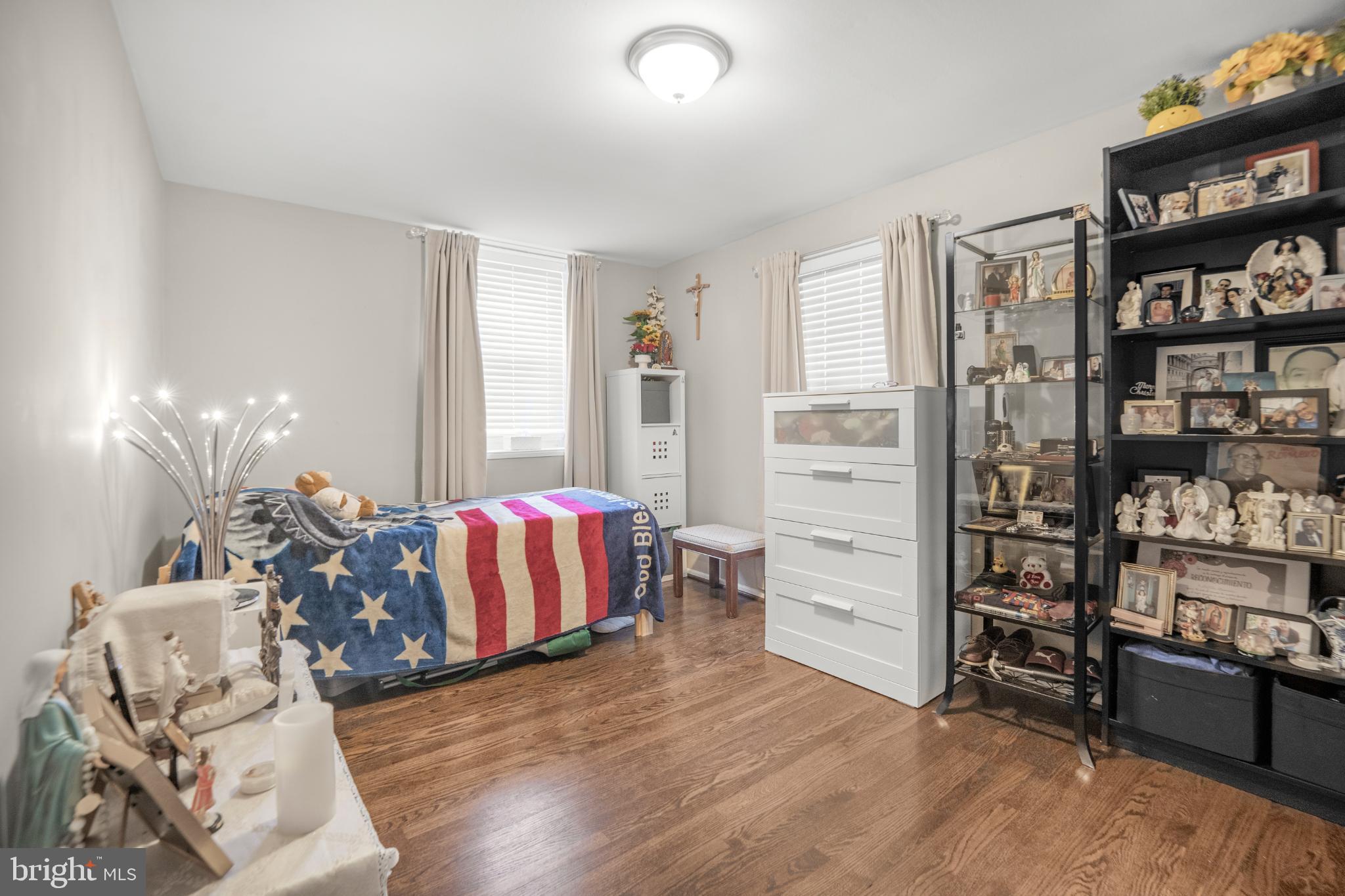 7617 Allendale Circle Landover, MD 20785 - Photo 21 of 26 a living room with furniture and a book shelf